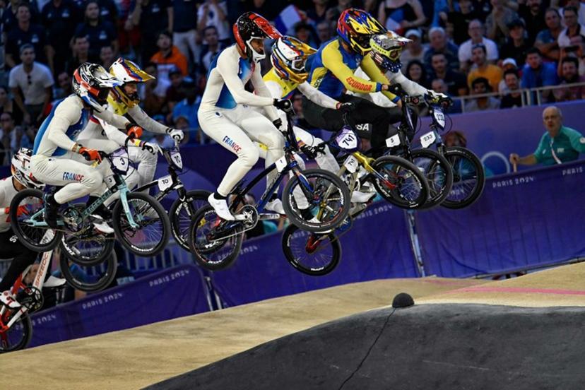 Riders compete in the third run of the Men's Cycling BMX Racing semifinals during the Paris 2024 Olympic Games in Saint-Quentin-en-Yvelines, on August 2, 2024.  Mauro PIMENTEL / AFP