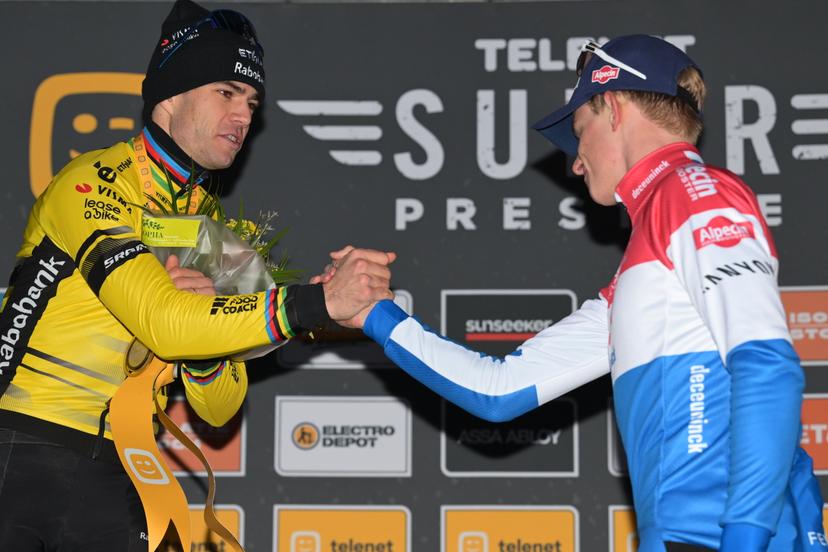 Belgian Wout van Aert and Dutch Tibor Del Grosso pictured on the podium after the men elite race at the cyclocross cycling event in Heusden-Zolder, stage 5/8 in the Superprestige competition, Tuesday 23 December 2025. BELGA PHOTO DAVID PINTENS