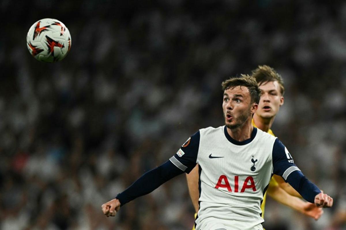 Tottenham Hotspur's English midfielder #10 James Maddison eyes the ball as he prepares to control it prior to shoot and score his team second goal during the UEFA Europa League Semi-Final First Leg football match between Tottenham Hotspur and Bodoe/Glimt at the Tottenham Hotspur Stadium in London, on May 1, 2025.  Ben STANSALL / AFP