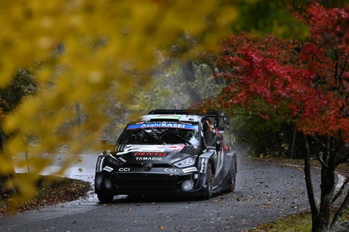 Elfyn Evans and his co-driver Scott Martin of Britain drive their Toyota GR Yaris Rally1 during the SS16 Lake Mikawako section of the Rally Japan, the 13th round of the FIA World Rally Championships, in Toyota city, Aichi prefecture on November 9, 2025.  Toshifumi KITAMURA / AFP