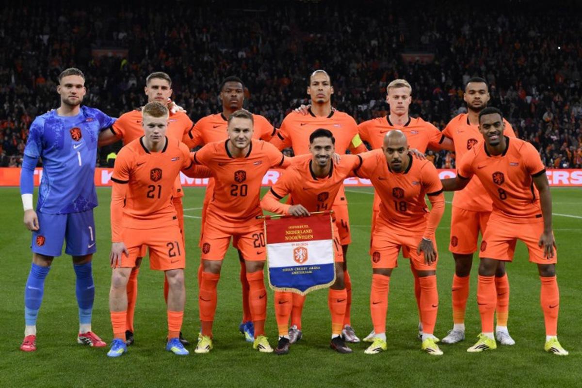 Netherlands' players pose for a team picture before the start of the friendly football match between the Netherlands and Norway at the Johan Cruijff Arena in Amsterdam on March 27, 2026.   JOHN THYS / AFP
