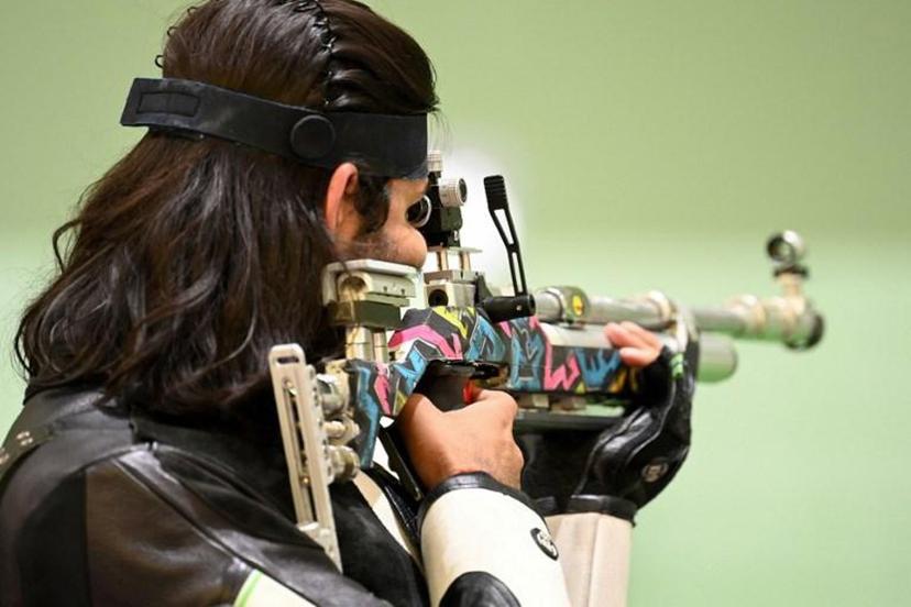 India's Divyansh Singh Panwar competes in the men?s 10m air rifle qualification during the Tokyo 2020 Olympic Games at the Asaka Shooting Range in the Nerima district of Tokyo on July 25, 2021.  Tauseef MUSTAFA / AFP