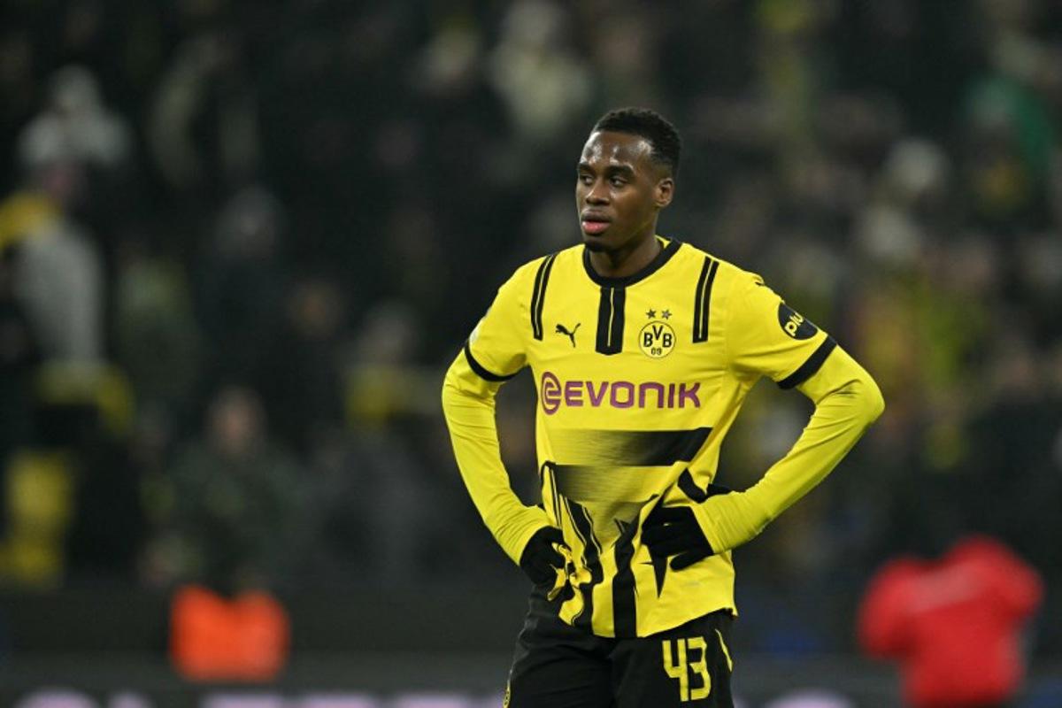 Borussia Dortmund's English forward #43 Jamie Bynoe-Gittens reacts at the end of the UEFA Champions League football match between Borussia Dortmund and FC Barcelona in Dortmund, western Germany on December 11, 2024. Barcelona won the match 3-2. INA FASSBENDER / AFP