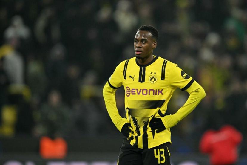 Borussia Dortmund's English forward #43 Jamie Bynoe-Gittens reacts at the end of the UEFA Champions League football match between Borussia Dortmund and FC Barcelona in Dortmund, western Germany on December 11, 2024. Barcelona won the match 3-2. INA FASSBENDER / AFP