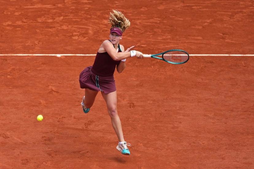 Russia's Mirra Andreeva plays a forehand return to Australia's Daria Kasatkina during their women's singles match on day 9 of the French Open tennis tournament on Court Suzanne-Lenglen at the Roland-Garros Complex in Paris on June 2, 2025.  Dimitar DILKOFF / AFP