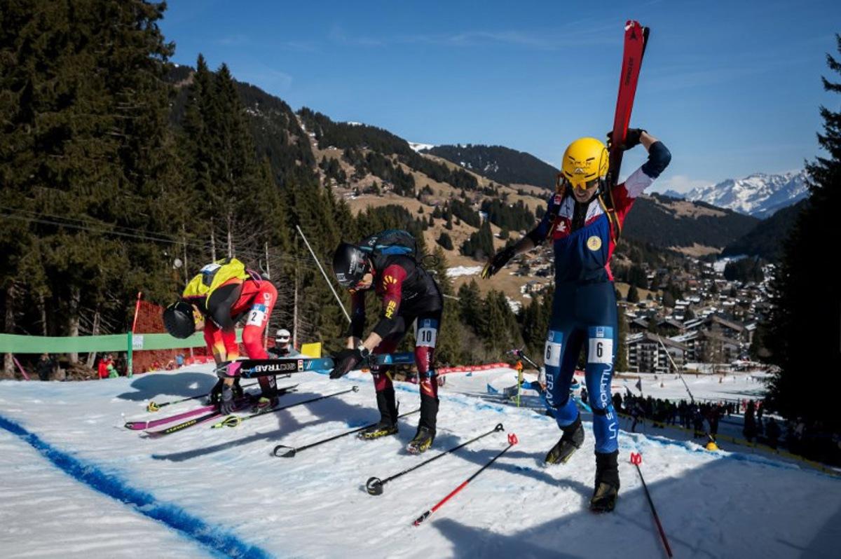 Spain's Oriol Cardona Coll #2, Belgium's Maximilien Drion du Chapois #10 and France's Thibault Anselmet #6 get ready when competing in the Men's Sprint Race semi-final at the Ski mountaineering (ISMF) World Championships in Morgins, Switzerland, on March 6, 2025.  Fabrice COFFRINI / AFP
