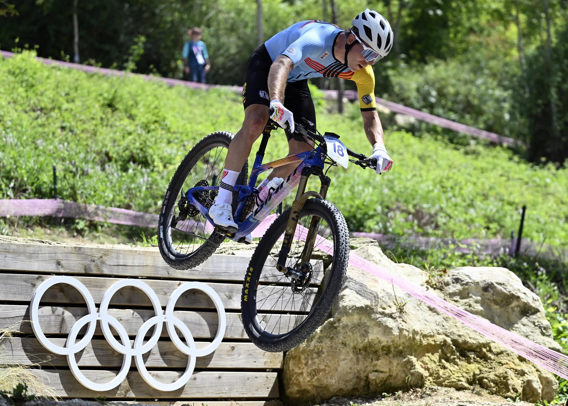 Belgian Jens Schuermans pictured in action during the men's cross-country mountain bike cycling race at the Paris 2024 Olympic Games, at the Colline d'Elancourt climb near Paris, France on Monday 29 July 2024. The Games of the XXXIII Olympiad are taking place in Paris from 26 July to 11 August. The Belgian delegation counts 165 athletes competing in 21 sports. BELGA PHOTO DIRK WAEM