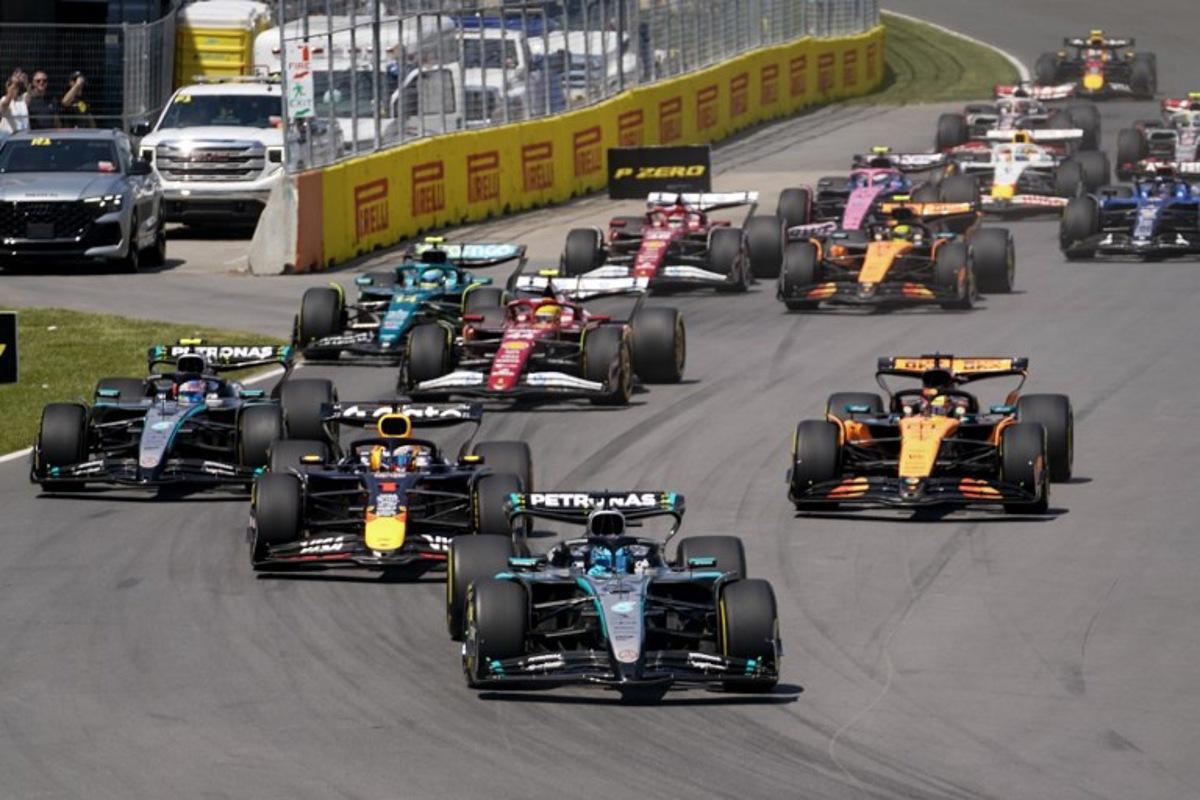 Mercedes' British driver George Russell leads the pack  during the 2025 Formula 1 Grand Prix du Canada at Circuit Gilles-Villeneuve in Montreal, Canada, on June 15, 2025.   Geoff Robins / AFP