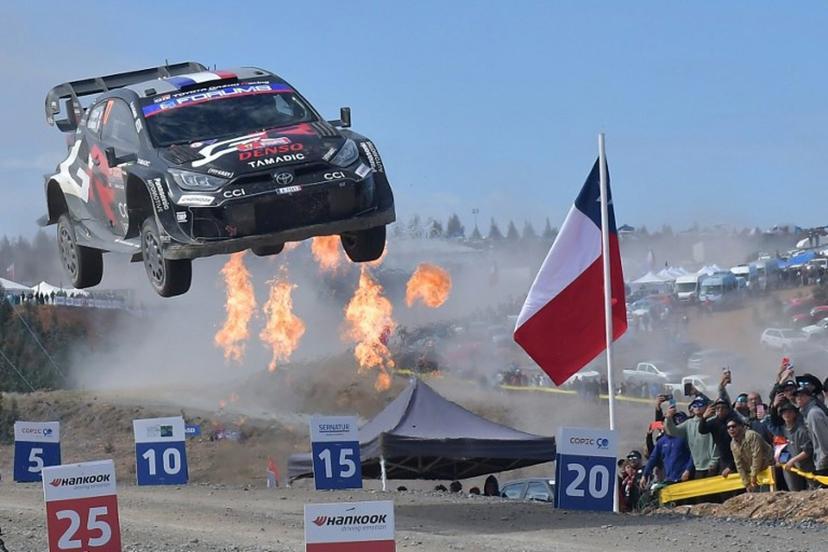 French driver Sebastien Ogier and co-driver Vincent Landais cross the finish line in their Toyota GR Yaris Rally1 to win the WRC Rally Chile Bio Bio in Concepcion, Chile, on September 14, 2025.  GUILLERMO SALGADO / AFP