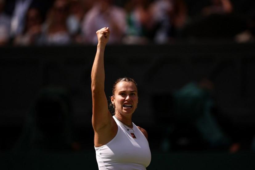 Belarus's Aryna Sabalenka celebrates after winning a point against US player Amanda Anisimova during their women's singles semi-final tennis match on the eleventh day of the 2025 Wimbledon Championships at The All England Lawn Tennis and Croquet Club in Wimbledon, southwest London, on July 10, 2025.  HENRY NICHOLLS / AFP