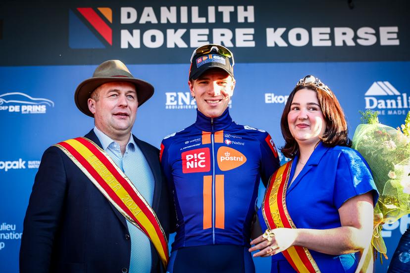 Dutch Nils Eekhoff of Team Picnic PostNL celebrates on the podium after winning the 'Nokere Koerse' one day cycling race for men elite, 188.1 km from Deinze to Nokere, on Wednesday 19 March 2025. BELGA PHOTO DAVID PINTENS