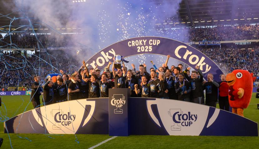 Club's players celebrate on the podium after winning a soccer game between Club Brugge and RSC Anderlecht in Brussels, Sunday 04 May 2025, the final of the 'Croky Cup' Belgian soccer cup. BELGA PHOTO JOHN THYS