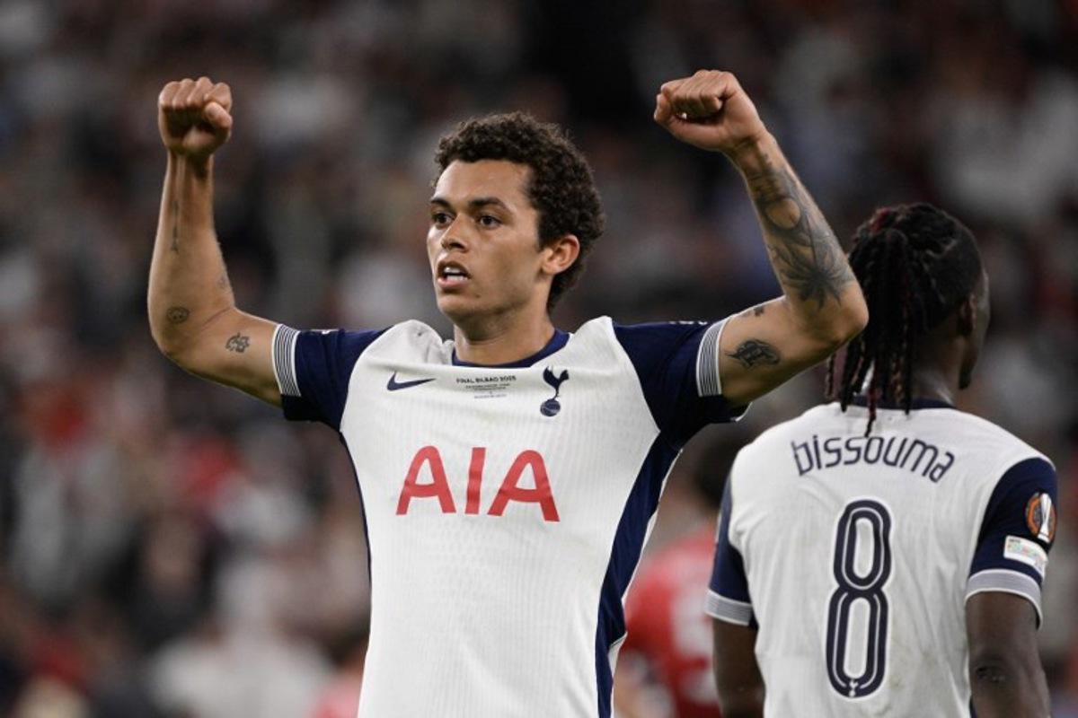 Tottenham Hotspur's Welsh forward #22 Brennan Johnson celebrates scoring the opening goal during the UEFA Europa League final football match between Tottenham Hotspur and Manchester United at San Mames stadium in Bilbao on May 21, 2025.  Josep LAGO / AFP