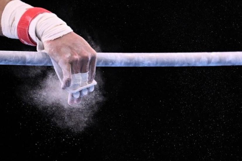 Chinese Taipei's Chih Kai Lee competes in the horizontal bar event of the artistic gymnastics men's all-around final during the Tokyo 2020 Olympic Games at the Ariake Gymnastics Centre in Tokyo on July 28, 2021.  Lionel BONAVENTURE / AFP