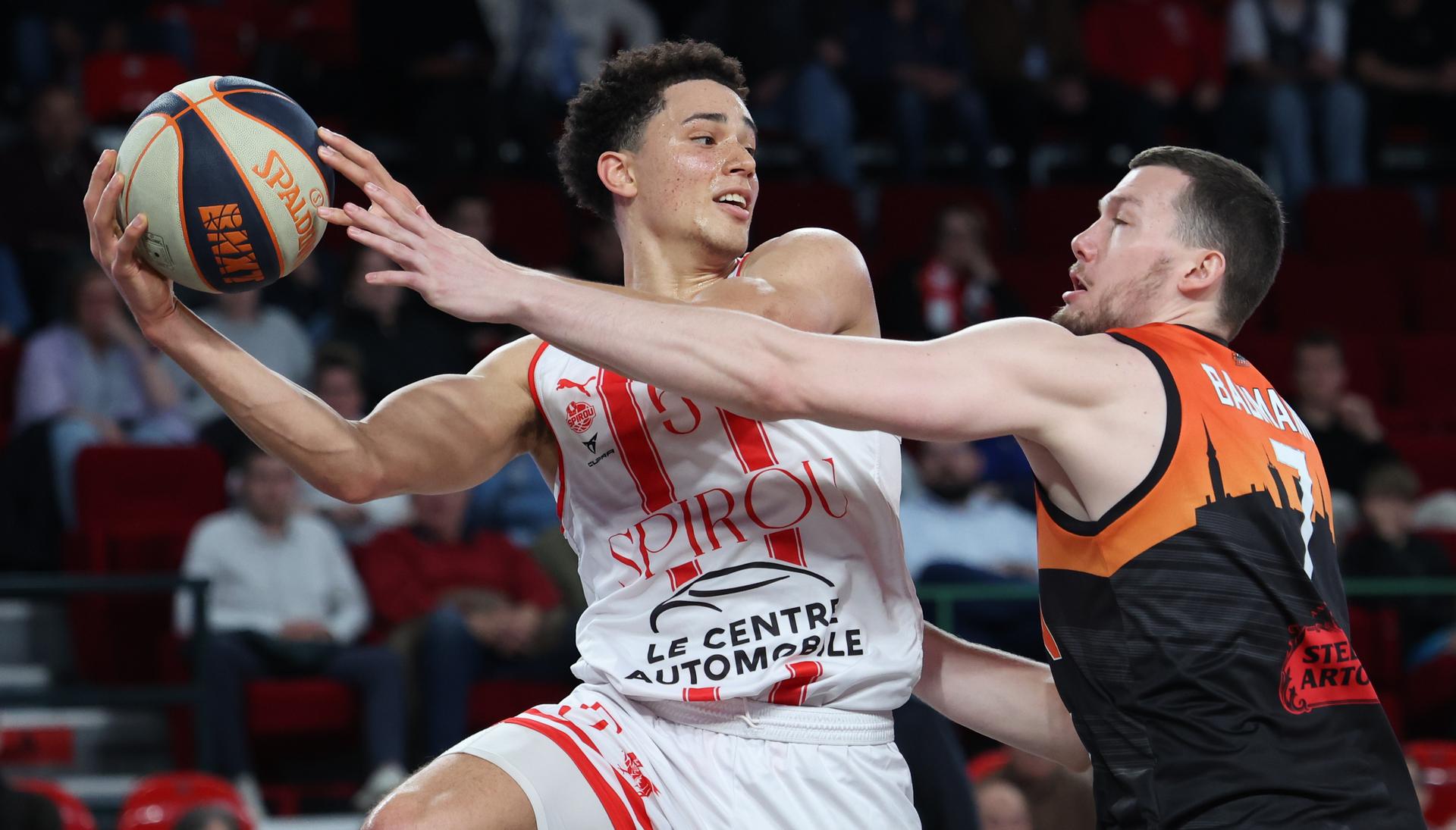 Spirou's Adedayo Polet and Leuven's Noah Bauman fight for the ball during a basketball match between Spirou Charleroi and Leuven Bears, Thursday 17 April 2025 in Charleroi, on day 33 of the 'BNXT League' Belgian and Dutch first division basket championships. BELGA PHOTO VIRGINIE LEFOUR