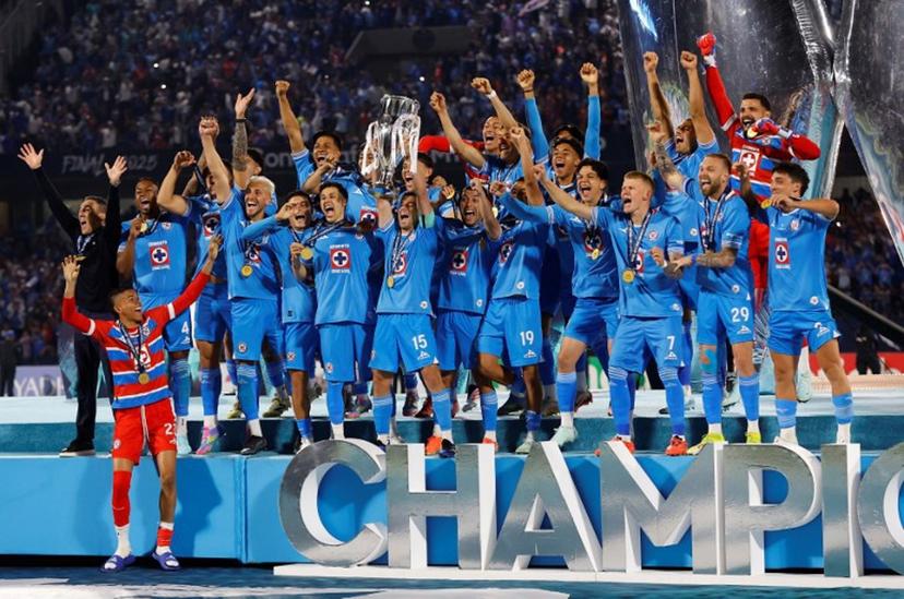 Cruz Azul's Uruguayan midfielder #15 Ignacio Rivero lifts the trophy next to teammates after winning the CONCACAF Champions Cup final football match between Mexico's Cruz Azul and Canada's Vancouver Whitecaps at the Olimpico Universitario Stadium in Mexico City on June 1, 2025.  DANIEL GAMEZ GUTIERREZ / AFP