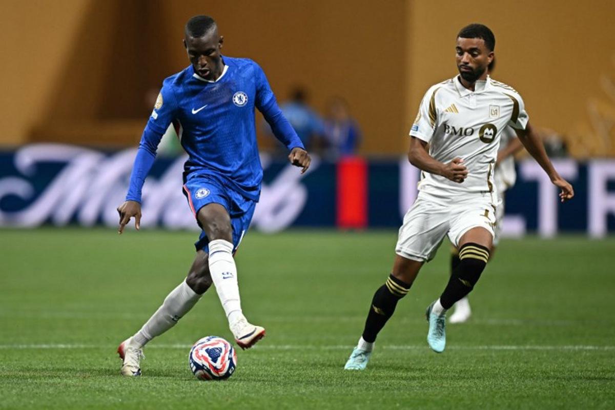 LAFC's German midfielder #11 Timothy Tillman (R) fights for the ball with Chelsea's Senegalese striker #15 Nicolas Jackson during the FIFA Club World Cup 2025 Group D football match between England's Chelsea and US Los Angeles FC at the Mercedes-Benz stadium in Atlanta on June 16, 2025.  Paul ELLIS / AFP