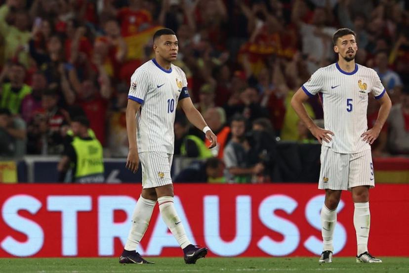 France's forward #10 Kylian Mbappe and France's defender #05 Clement Lenglet react  during the UEFA Nations League semi-final football match between Spain and France in Stuttgart, southwestern Germany, on June 5, 2025.  FRANCK FIFE / AFP