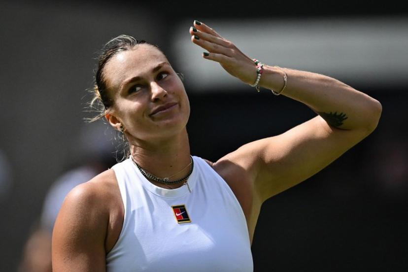 Belarus's Aryna Sabalenka celebrates after winning against Czech Republic's Marie Bouzkova at the end of their women's singles second round tennis match on the third day of the 2025 Wimbledon Championships at The All England Lawn Tennis and Croquet Club in Wimbledon, southwest London, on July 2, 2025.  Kirill KUDRYAVTSEV / AFP