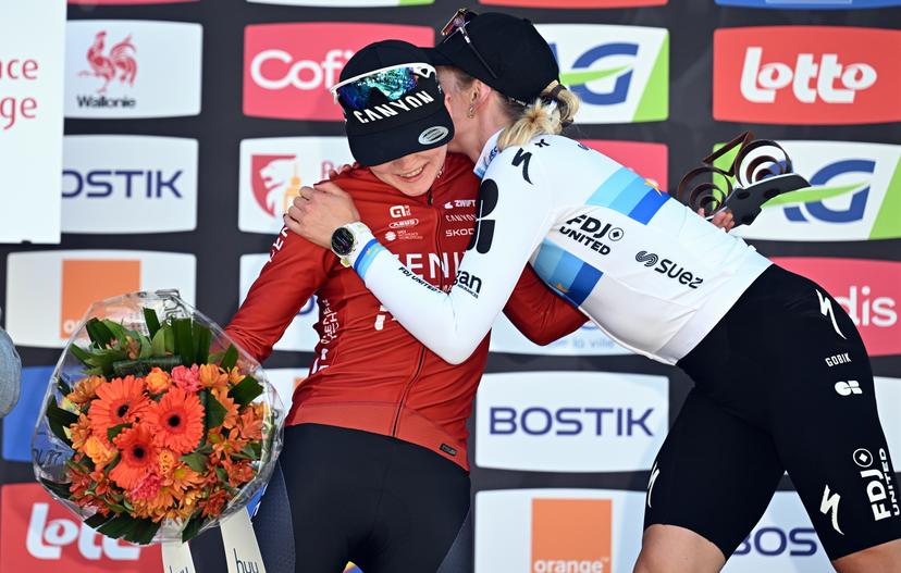 Dutch Puck Pieterse of Fenix-Premier Tech, Dutch Demi Vollering of FDJ United-SUEZ and Spanish Paula Blasi of UAE Team ADQ pictured on the podium after the women's race of the 'La Fleche Wallonne', one day cycling race (Waalse Pijl - Walloon Arrow), 148,2 km from Huy to Huy, Wednesday 22 April 2026. BELGA PHOTO DAVID PINTENS