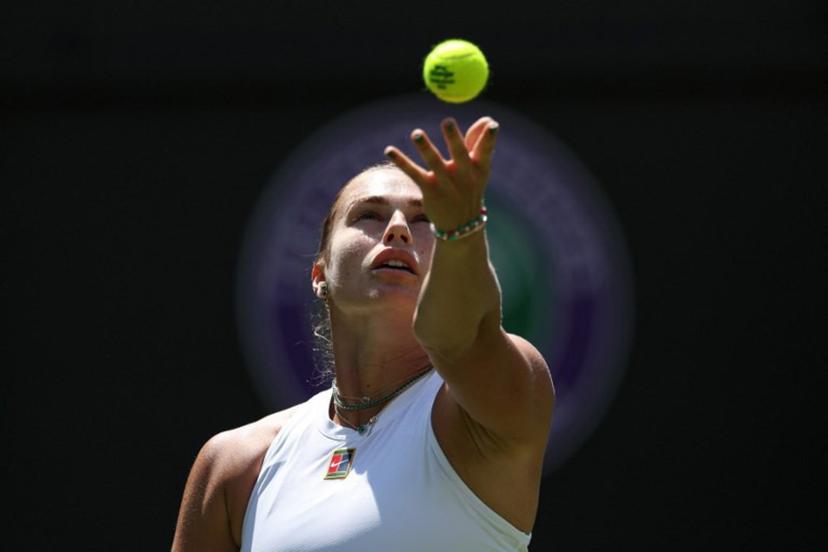 Belarus's Aryna Sabalenka serves to US-Canada's Carson Branstine during their women's singles first round tennis match on the first day of the 2025 Wimbledon Championships at The All England Lawn Tennis and Croquet Club in Wimbledon, southwest London, on June 30, 2025.  Adrian Dennis / AFP