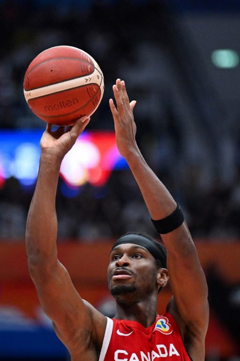 Canada's Shai Gilgeous-Alexander shoots during the FIBA Basketball World Cup match between Spain and Canada at Indonesia Arena in Jakarta on September 3, 2023.  ADEK BERRY / AFP