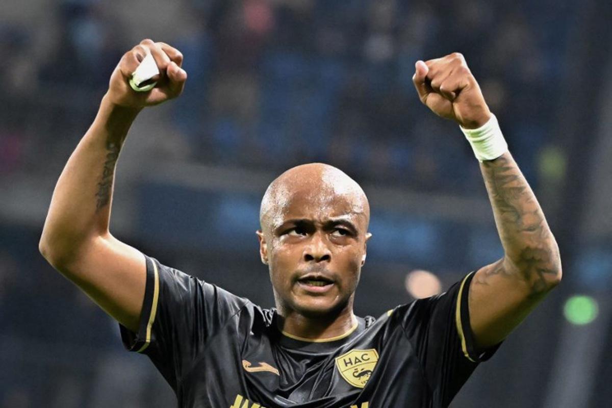 Le Havre's Ghanian forward #28 Andre Ayew celebrates after winning the French L1 football match between Le Havre AC (HAC) and Montpellier HSC at the Oceane Stadium in Le Havre, Northwestern France, on November 3, 2024.  Lou BENOIST / AFP