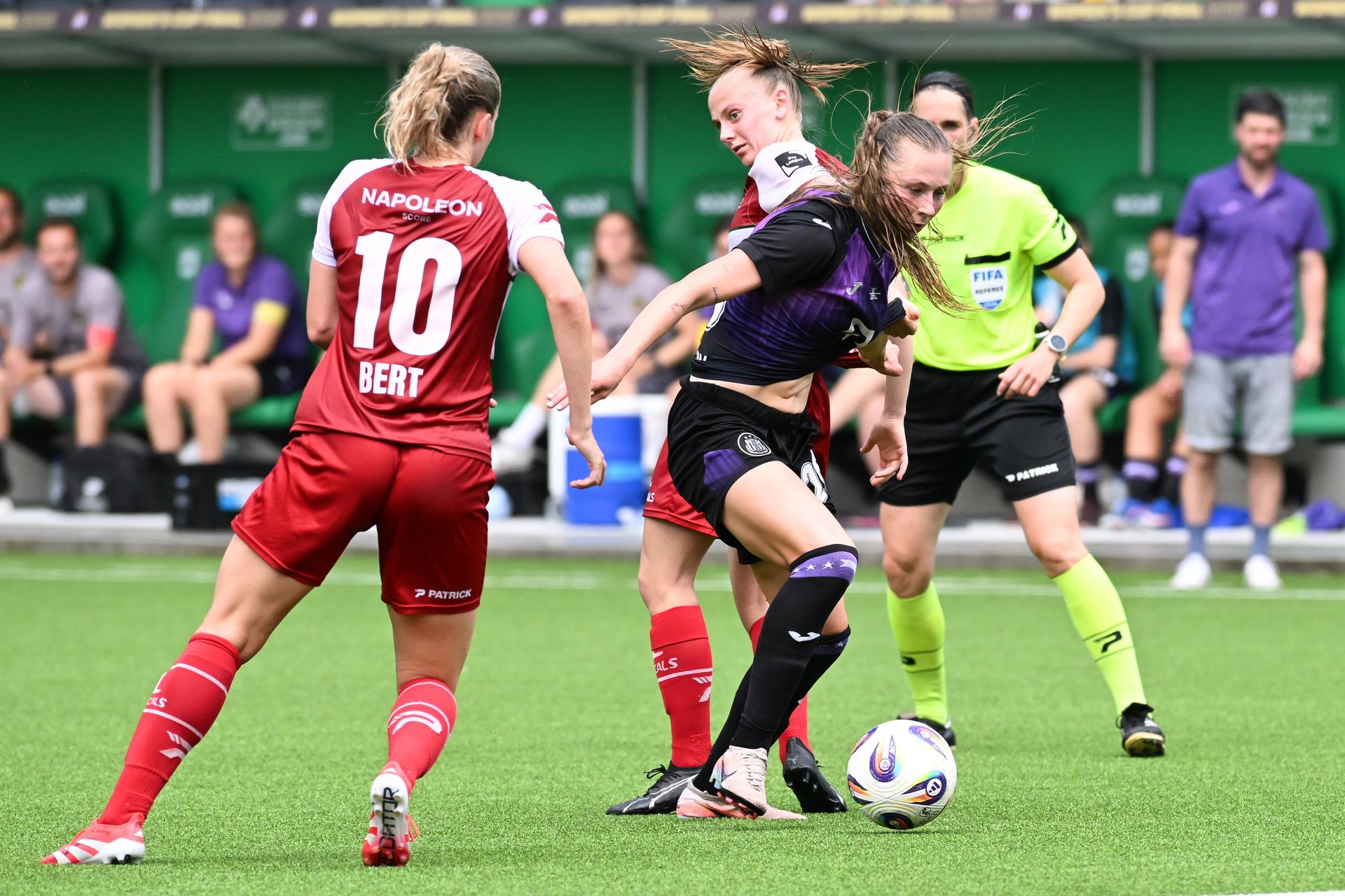 Essevee's Amber Bert, Anderlecht's Rimante Jonusaite and Zulte's Lisa Vanhentenrijk pictured in action during a soccer game between RSC Anderlecht and Zulte Waregem, the final of the Belgian soccer cup, Saturday 30 May 2026, in La Louviere. BELGA PHOTO JILL DELSAUX