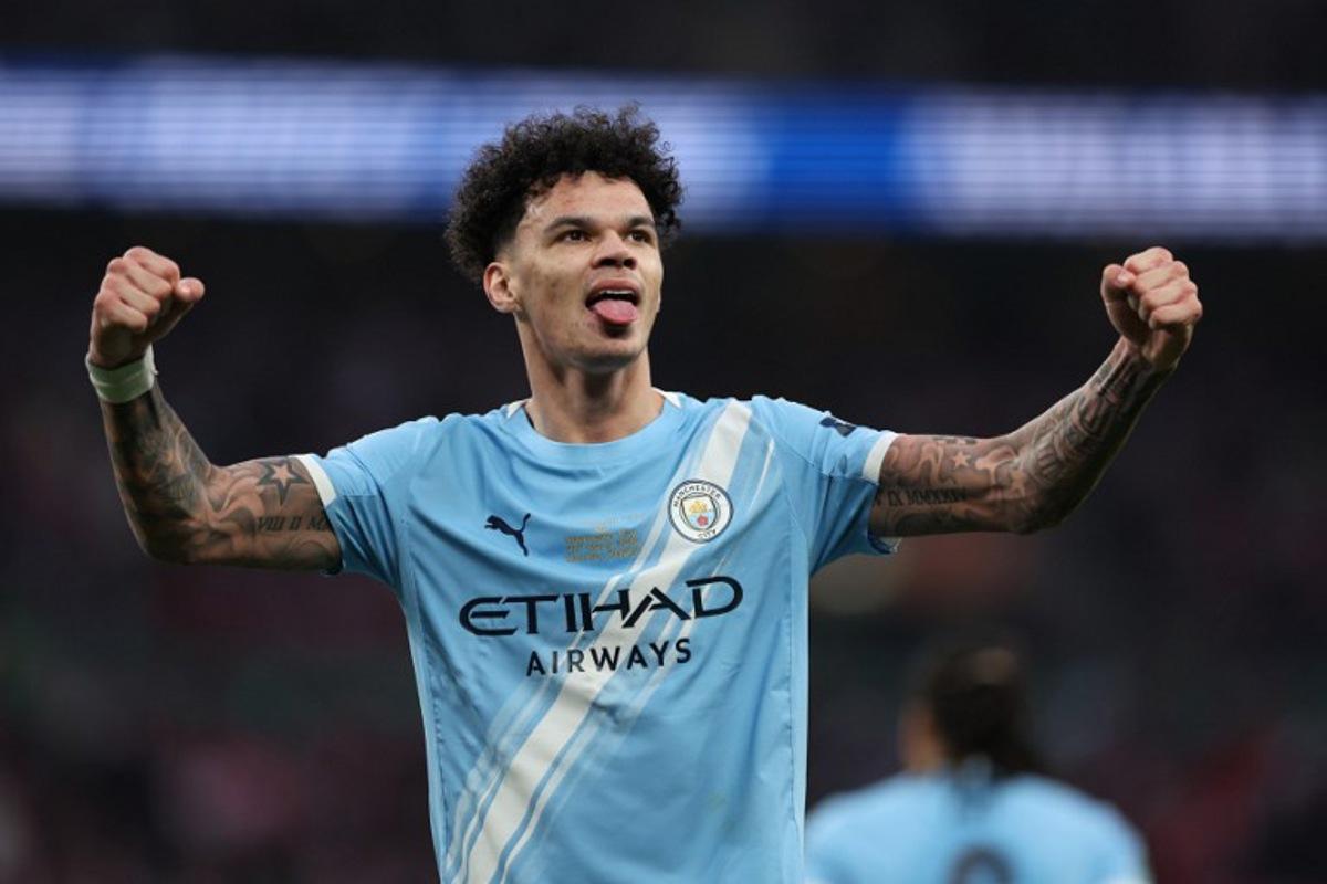 Manchester City's English midfielder #33 Nico O'Reilly celebrates scoring their second goal during the English League Cup final football match between Arsenal and Manchester City at Wembley Stadium in London on March 22, 2026.  Adrian Dennis / AFP