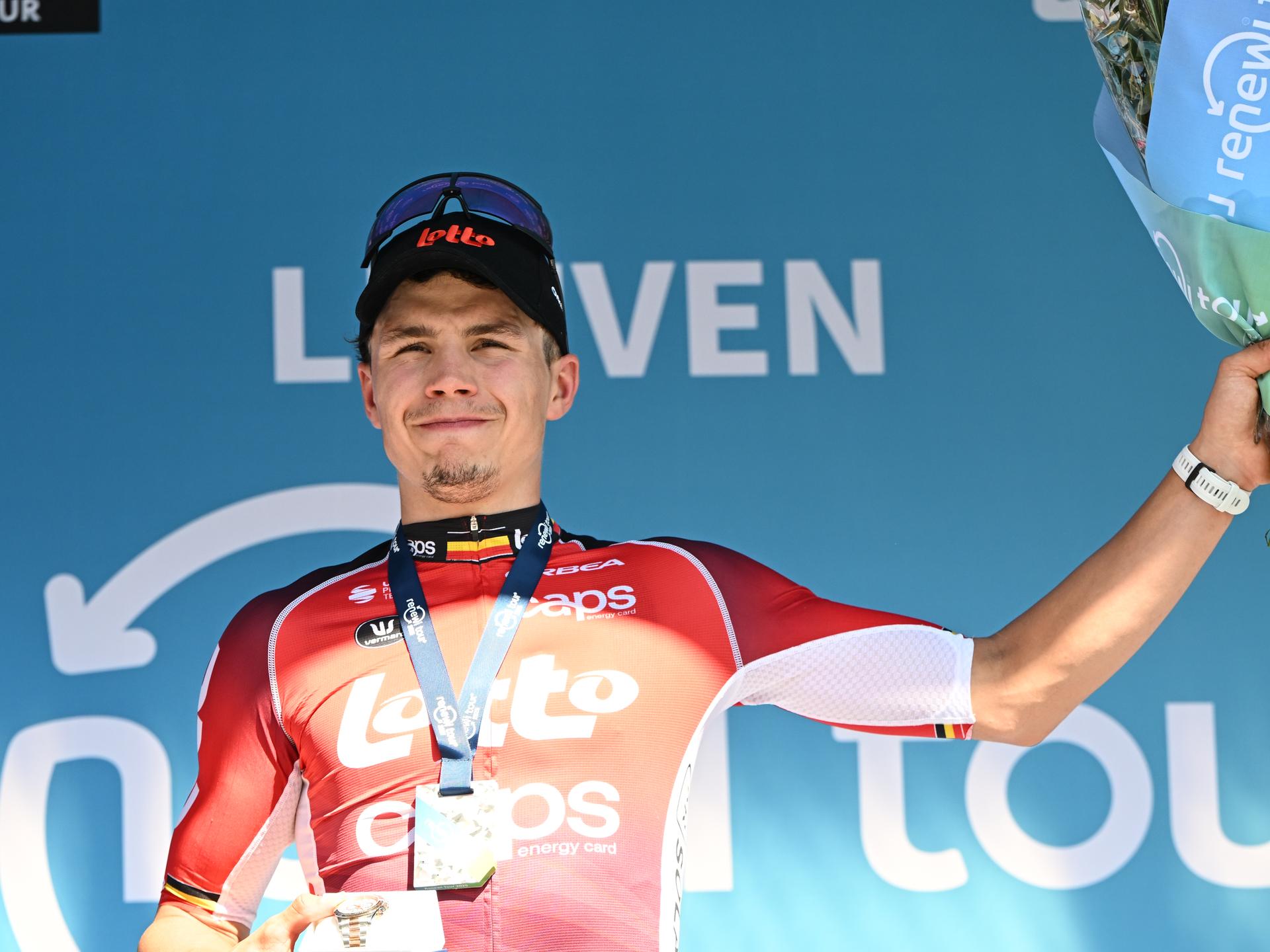 Belgian Arnaud De Lie of Lotto Cycling Team celebrates on the podium after winning the fifth and last stage of the 'Renewi Tour' multi-stage cycling race, 185km from and to Leuven on Sunday 24 August 2025. The five-day race takes place in Belgium and the Netherlands.  BELGA PHOTO DAVID PINTENS