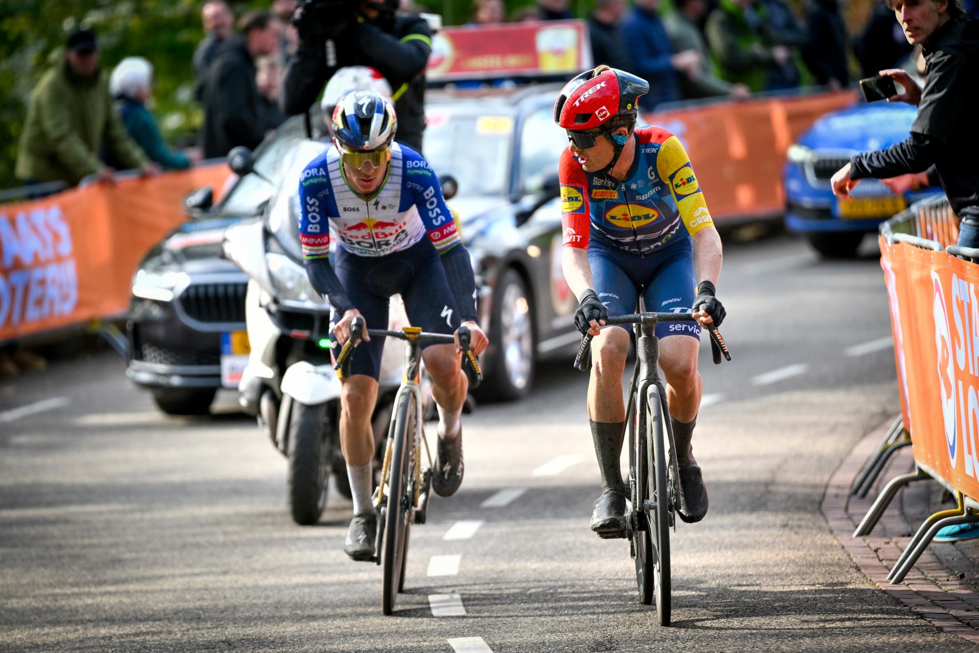 Belgian Remco Evenepoel of Red Bull-BORA-hansgrohe and Danish Mattias Skjelmose of Lidl-Trek pictured in action during the men elite 'Amstel Gold Race' one day cycling race, 257,4 km from Maastricht to Valkenburg, The Netherlands, Sunday 19 April 2026. BELGA PHOTO POOL VINCENT KALUT
