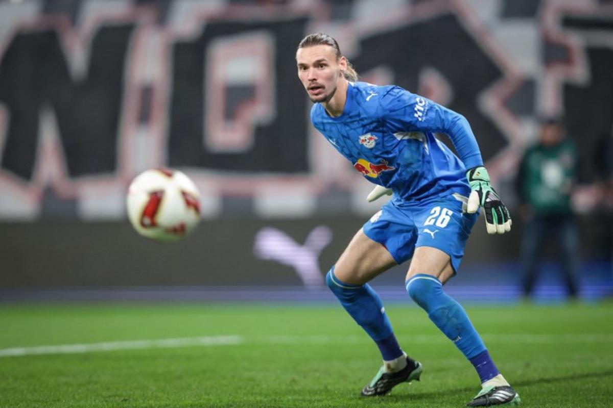 Leipzig's Belgian goalkeeper #26 Maarten Vandevoordt eyes the ball during the German first divison Bundesliga football match between RB Leipzig and Eintracht Frankfurt in Leipzig, eastern Germany on October 10, 2026.  Ronny HARTMANN / AFP