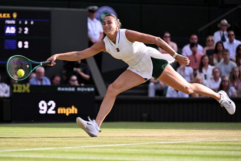 Belarus's Aryna Sabalenka returns to Japan's Naomi Osaka during their women's singles round of 16 tennis match on the seventh day of the 2026 Wimbledon Championships at The All England Lawn Tennis and Croquet Club in Wimbledon, southwest London, on July 5, 2026.  Kirill KUDRYAVTSEV / AFP