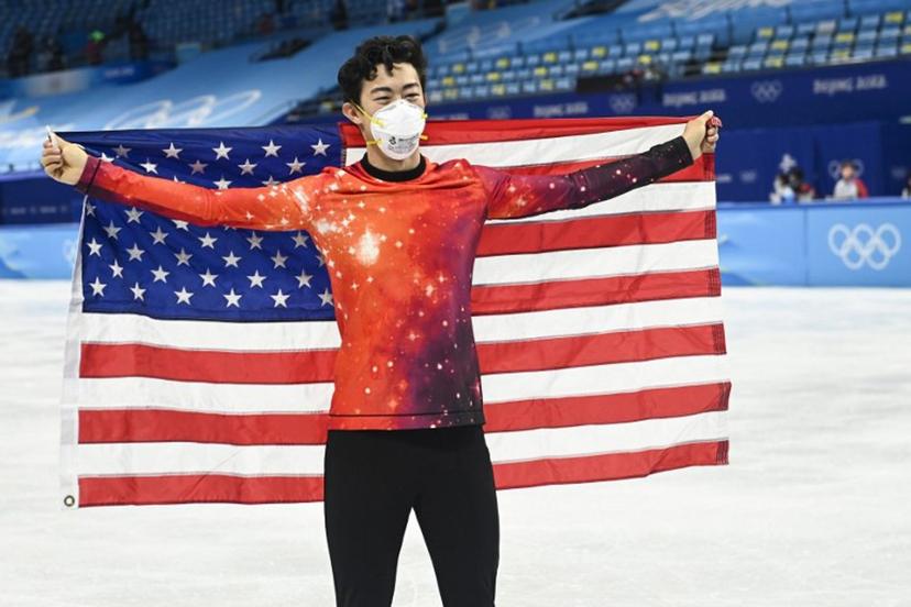 Gold medallist USA's Nathan Chen celebrates during the venue ceremony of the men's single figure skating event during the Beijing 2022 Winter Olympic Games at the Capital Indoor Stadium in Beijing on February 10, 2022.  WANG Zhao / AFP