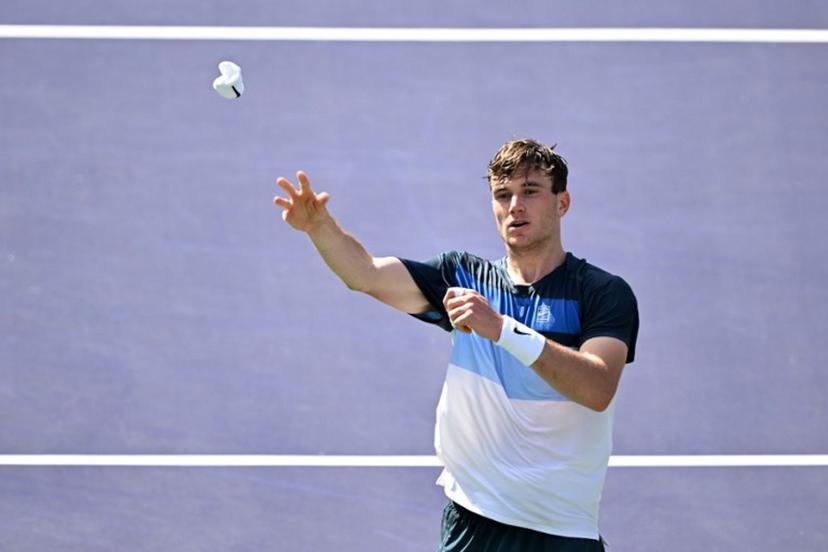 Britain's Jack Draper throws his sweatband after defeating Denmark's Holger Rune during the men's singles final tennis match at the BNP Paribas Open at the Indian Wells Tennis Garden in Indian Wells, California, on March 16, 2025.  Patrick T. Fallon / AFP