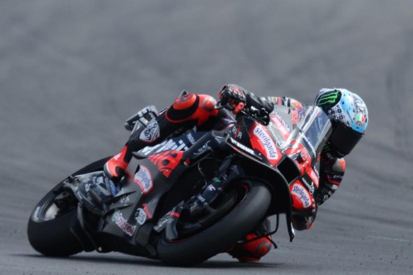 Aprilia Racing team's Italian MotoGP rider Marco Bezzecchi leads during the MotoGP British Grand Prix at Silverstone circuit in Northamptonshire, central England, on May 25, 2025.   Adrian Dennis / AFP