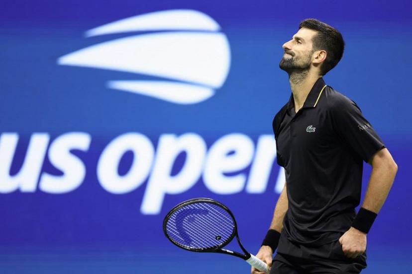 Serbia's Novak Djokovic reacts to a point during the men's singles quarterfinal tennis match against USA's Taylor Fritz  on day ten of the US Open tennis tournament at the USTA Billie Jean King National Tennis Center in New York City, on September 2, 2025.  CHARLY TRIBALLEAU / AFP