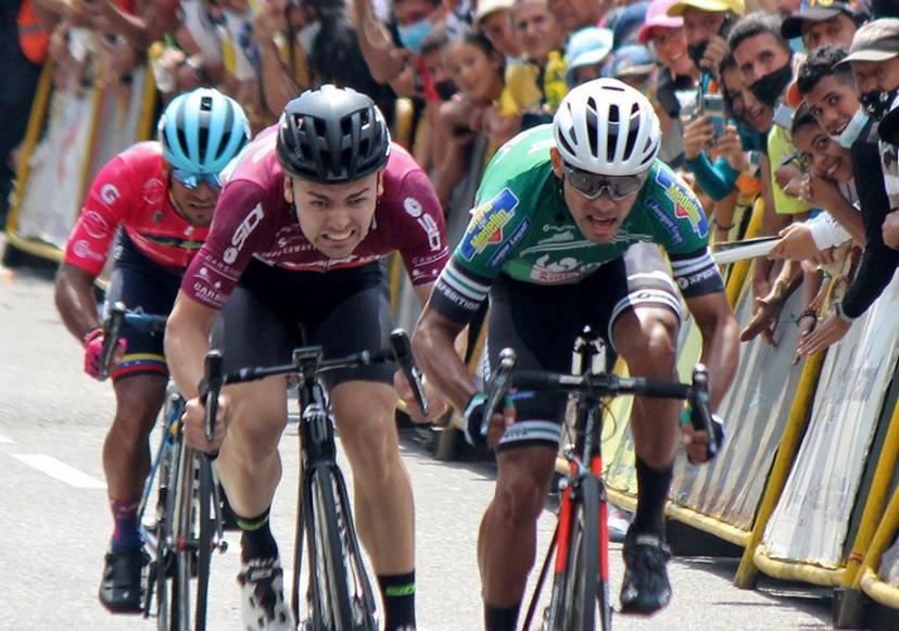 Colombia's Johan Colon (R), from team Idea Indeportes Antioquia, and Serbia's Dusan Rajovic, from Team Corratec, sprint to the finish line during the first stage of the 57th Vuelta al Tachira en Bicicleta multi-day road bicycle race, in San Cristobal, Tachira State, Venezuela, on January 16, 2022.  Jhonny PARRA / AFP