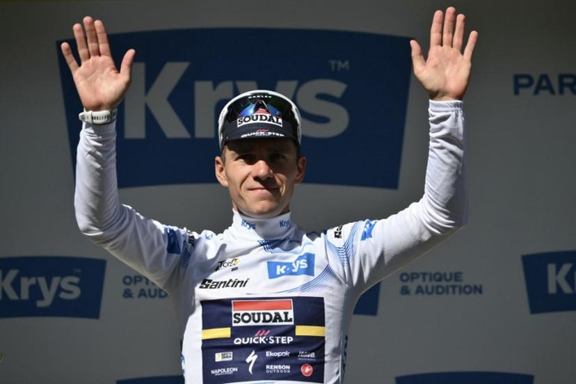 Soudal Quick-Step team's Belgian rider Remco Evenepoel celebrates on the podium with the best young rider's white jersey after the 6th stage of the 112th edition of the Tour de France cycling race, 201.5 km between Bayeux and Vire Normandie, Northwestern France, on July 10, 2025.  Marco BERTORELLO / AFP
