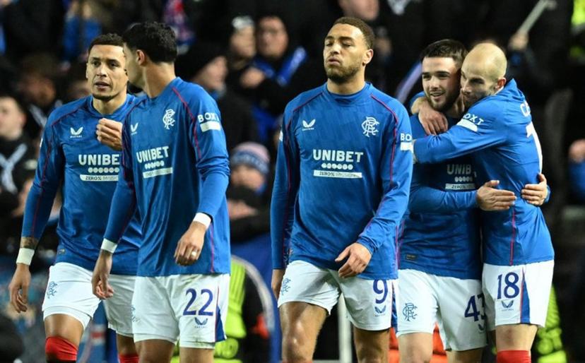 Rangers' Belgian midfielder #43 Nicolas Raskin (2R) celebrates scoring the opening goal during the UEFA Europa League football match between Rangers and Royale Union Saint-Gilloise at the Ibrox Stadium in Glasgow on January 30, 2025.  ANDY BUCHANAN / AFP