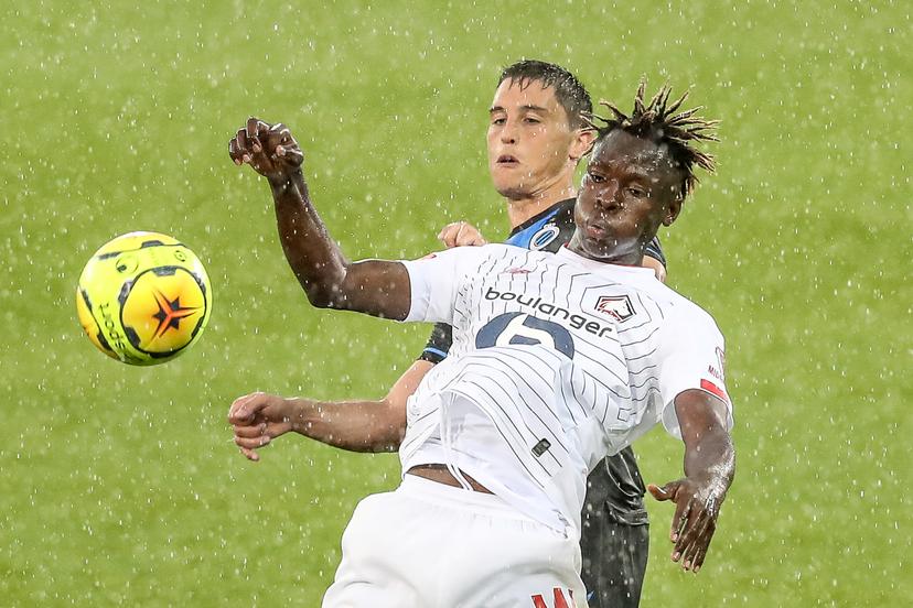 Club's Federico Ricca and Lille's Usman Simbakoli fight for the ball during a friendly soccer game between Club Brugge KV and French team Lille OSC, during the 'Brugse Metten', Saturday 25 July 2020 in Brugge, in preparation of the upcoming 2020-2021 season. BELGA PHOTO BRUNO FAHY
