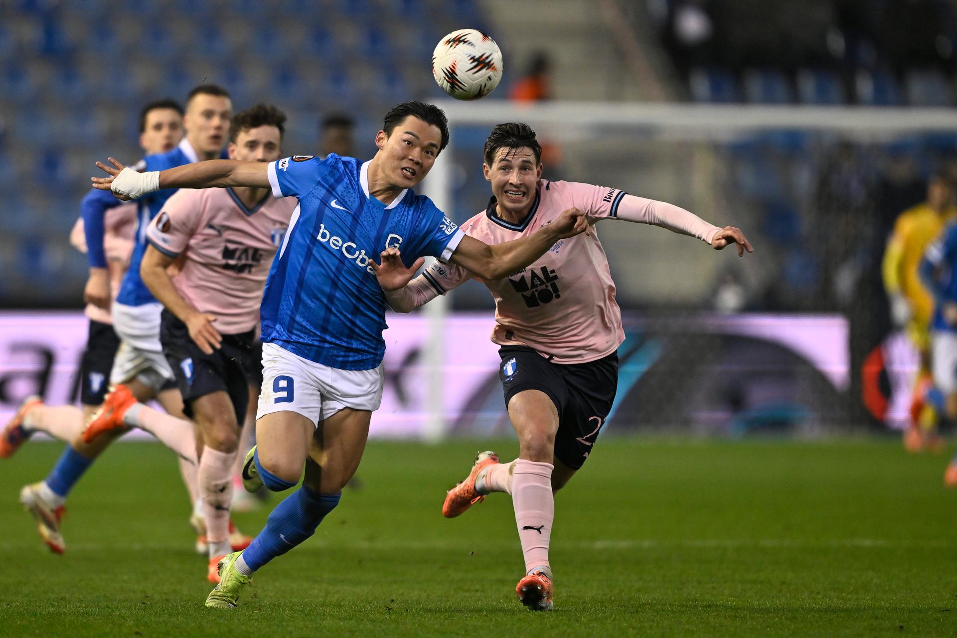 Genk's Hyeon-Gyu Oh and Malmo's Lasse Berg Johnsen fight for the ball during a soccer game between Belgian soccer team KRC Genk and Swedish team Malmo FF, in Genk, on Thursday 29 January 2026, on day eight of the League phase of the UEFA Europa League tournament. BELGA PHOTO JOHAN EYCKENS