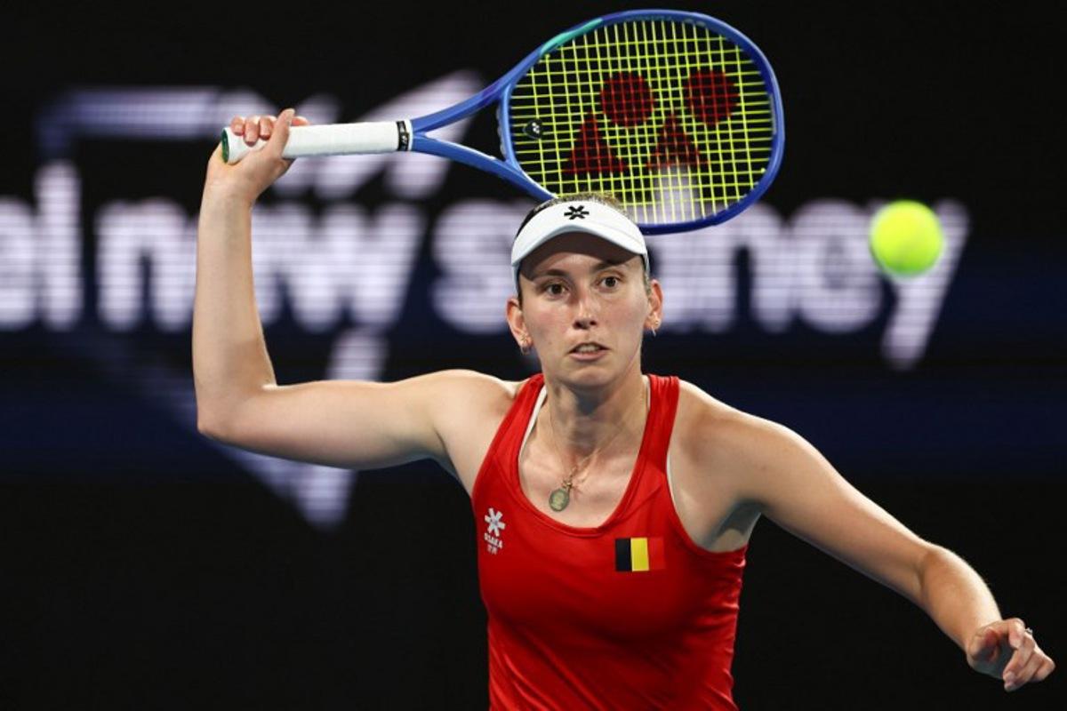 Belgium's Elise Mertens hits a return to Czech Republic's Barbora Krejcikova during their women's singles quarter-final match at the United Cup tennis tournament at Ken Rosewall Arena in Sydney on January 8, 2026.  Izhar KHAN / AFP