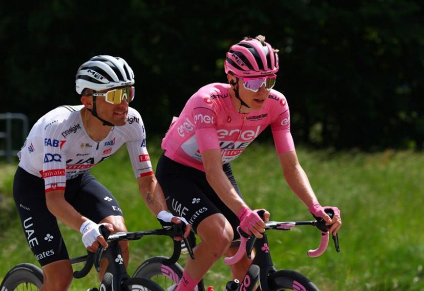 Team UAE's Slovenian rider Tadej Pogacar and Team UAE's Polish rider Rafal Majka rides during the 19th stage of the 107th Giro d'Italia cycling race, 157km between Mortegliano and Sappada on May 24, 2024.  Luca Bettini / AFP