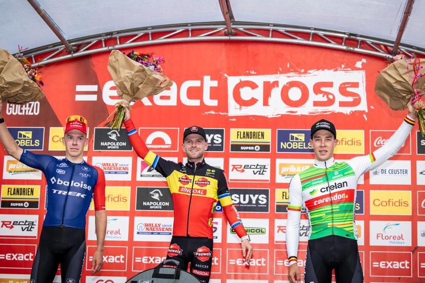 Dutch Pim Ronhaar, Belgian Eli Iserbyt and Belgian Laurens Sweeck pictured on the podium after the men's elite race of the Exact Cross, stage 3 (out of 7) in the Exact Cross cyclocross competition, in Heerderstrand, Netherlands, Saturday 26 October 2024. BELGA PHOTO DAVID PINTENS
