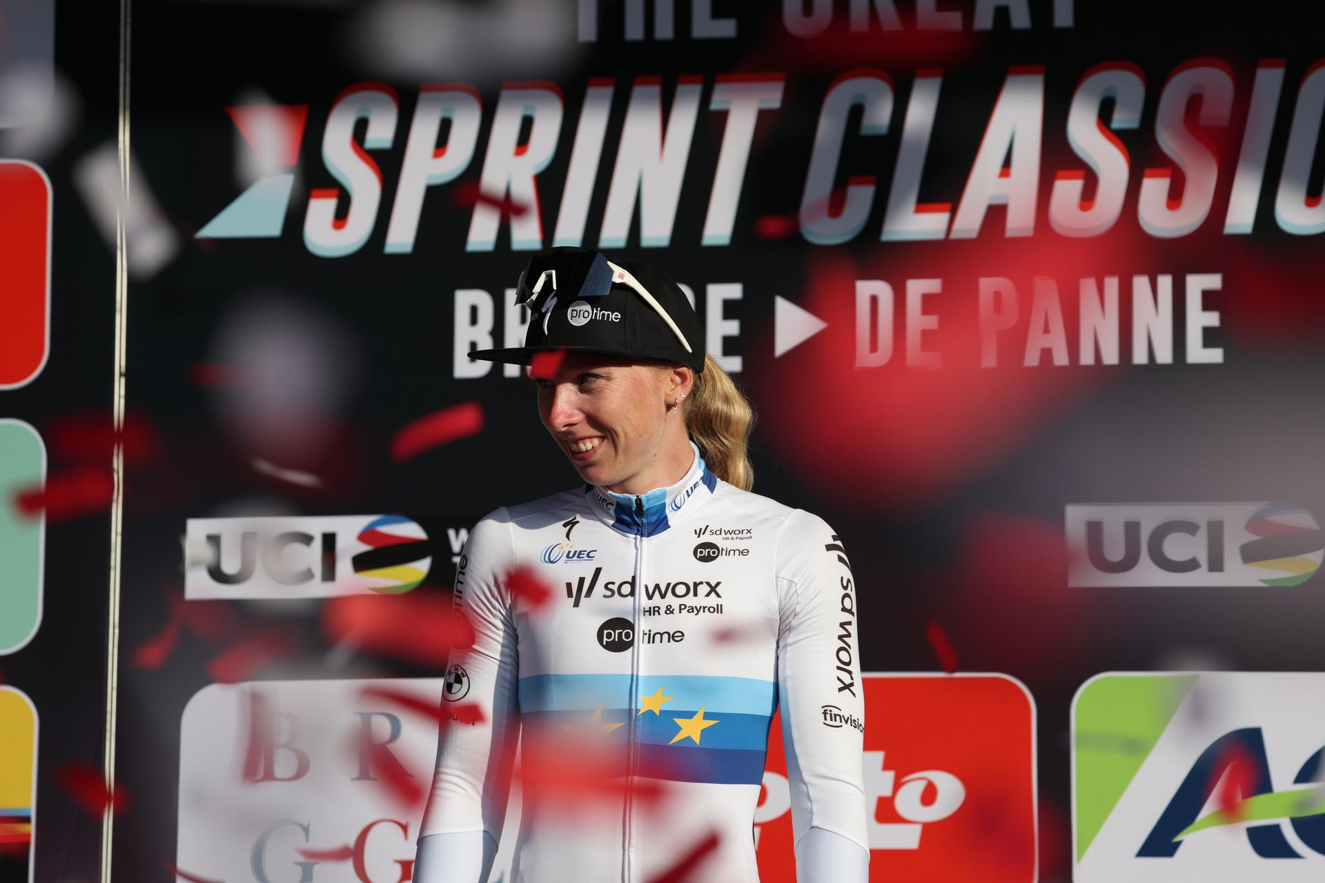 Dutch Lorena Wiebes of SD Worx-Protime celebrates on the podium after winning the 'Classic Brugge-De Panne' women's elite one-day cycling race, 152,7 km from Brugge to De Panne, Thursday 27 March 2025. BELGA PHOTO KURT DESPLENTER