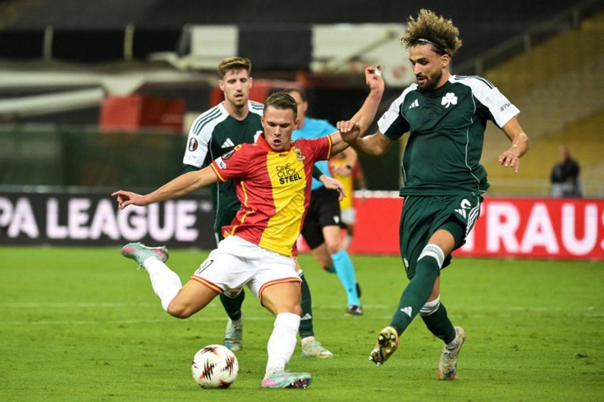 Panathinaikos' Algerian defender #05 Ahmed Touba (R) fights for the ball with Go Ahead Eagles' midfielder #17 Mathis Suray (L) during the UEFA Europa League first round day 2 football match between Panathinaikos and Go Ahead Eagles at the Athens Olympic Stadium, in Athens on October 2, 2025.  Angelos TZORTZINIS / AFP