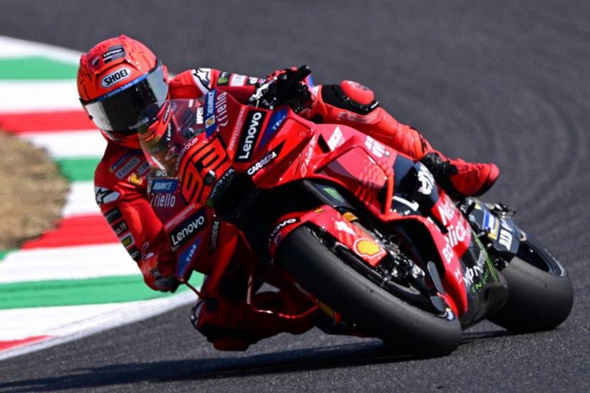 Ducati Lenovoi Team's Spanish MotoGP rider Marc Marquez steers his motorbike during the free practice sessions on the eve of the Italian Moto GP Grand Prix at Mugello circuit, in Mugello, near Florence, on June 21, 2025.   Tiziana FABI / AFP