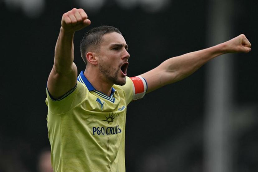 Southampton's English defender #06 Taylor Harwood-Bellis celebrates his team's victory at the end of the English FA Cup fifth round football match between Fulham and Southampton at Craven Cottage in London on March 8, 2026.  Glyn KIRK / AFP