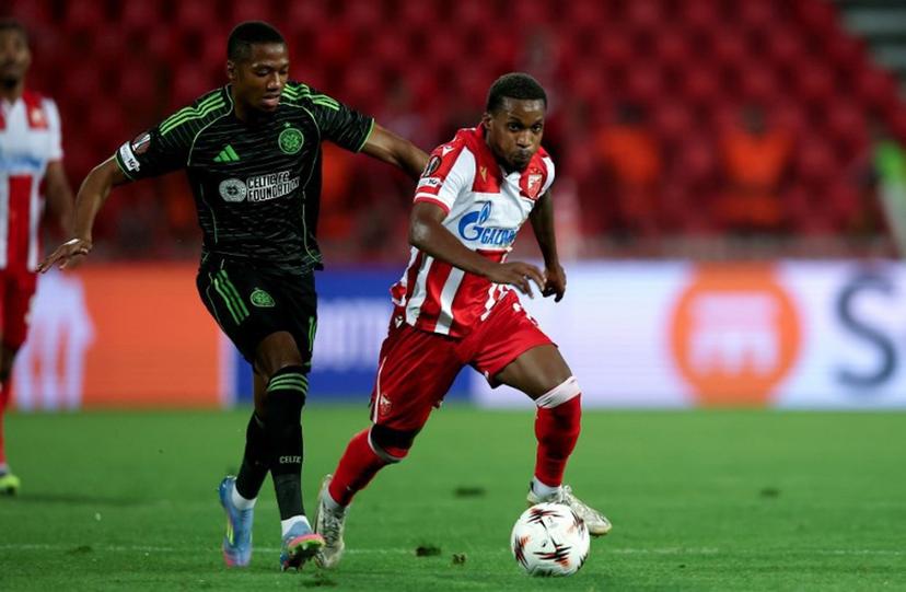 Crvena Zvezda's #7 Joao Felicio Mendes (R) vies with Celtic's #10 Michel-Ange Balikwisha (L) during the UEFA Europa League football match between Crvena Zvezda (Red Star Belgrade) and Celtic (Glasgow) at the "Rajko Mitic" stadium in Belgrade on September 24, 2025.  Predrag MILOSAVLJEVIC / AFP